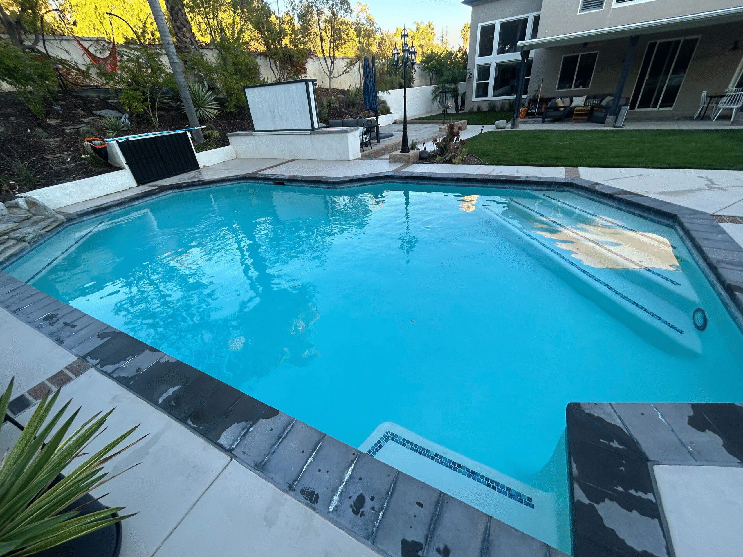 Pool Maintenance in Santa Clarita, CA, Expert A+ Plus Pool Cleaning staff conducting a detailed pool inspection and maintenance in Canyon Country, ensuring top-notch service near me