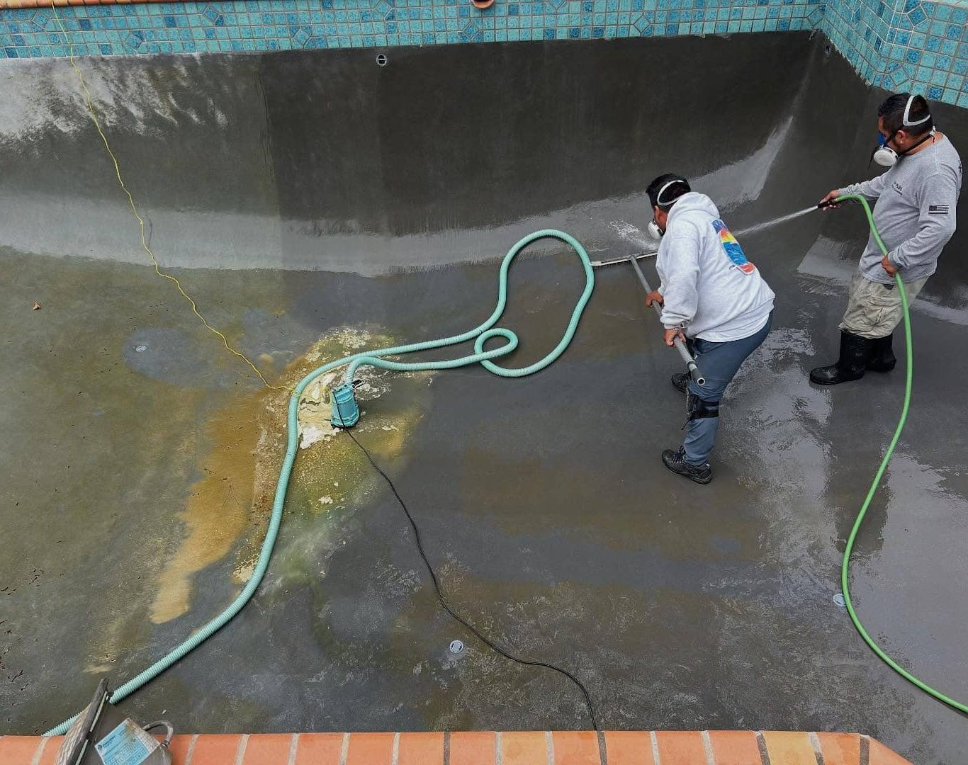Pool Maintenance Near Me, An expert pool technician assessing the water quality and equipment functionality during a service visit in Los Angeles County, CA, Professional pool technician from A+ Plus Pool Cleaning using advanced tools to ensure a perfectly balanced and clean pool in Stevenson Ranch