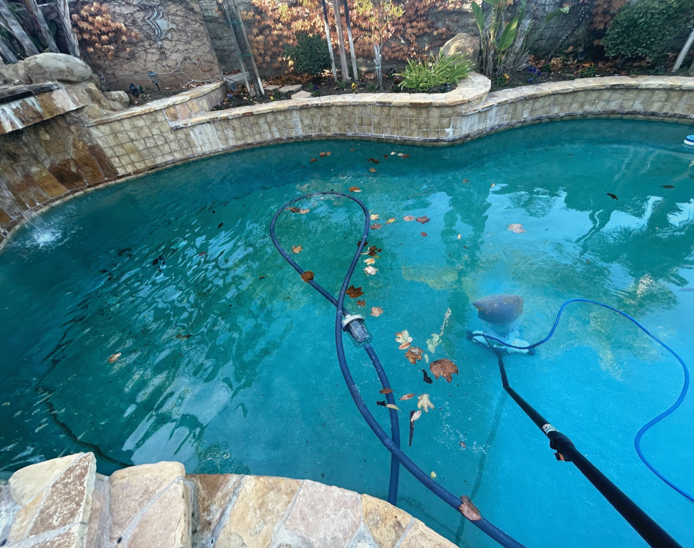 Pool Cleaning in Santa Clarita, CA, An expert pool technician assessing the water quality and equipment functionality during a service visit in Los Angeles County, CA, A+ Plus Pool Cleaning professional conducting thorough water quality test in Saugus pool, ensuring optimal health and safety standards