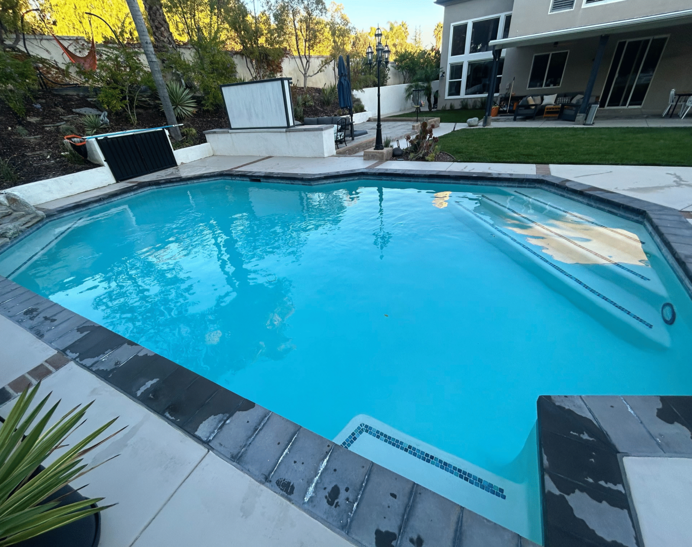 Pool Maintenance in Santa Clarita, CA, Expert A+ Plus Pool Cleaning staff conducting a detailed pool inspection and maintenance in Canyon Country, ensuring top-notch service near me